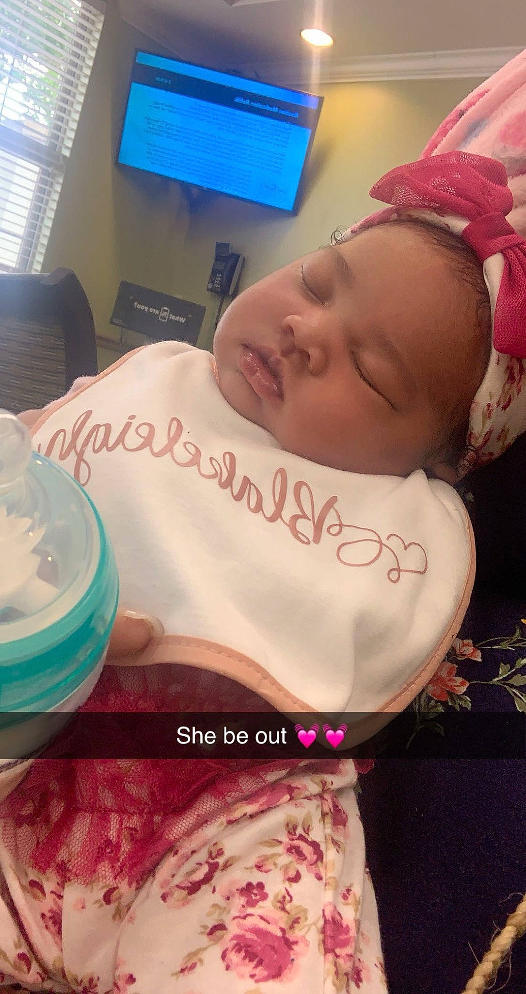 Blakeleigh is registered to the contest to win money with this photo: baby, baby_products, baby_toddler_clothing, cheek, child, eyebrow, happy, lip, magenta, mouth, muscle, neck, pattern, person, pink, room, skin, sleeve, t_shirt, toddler