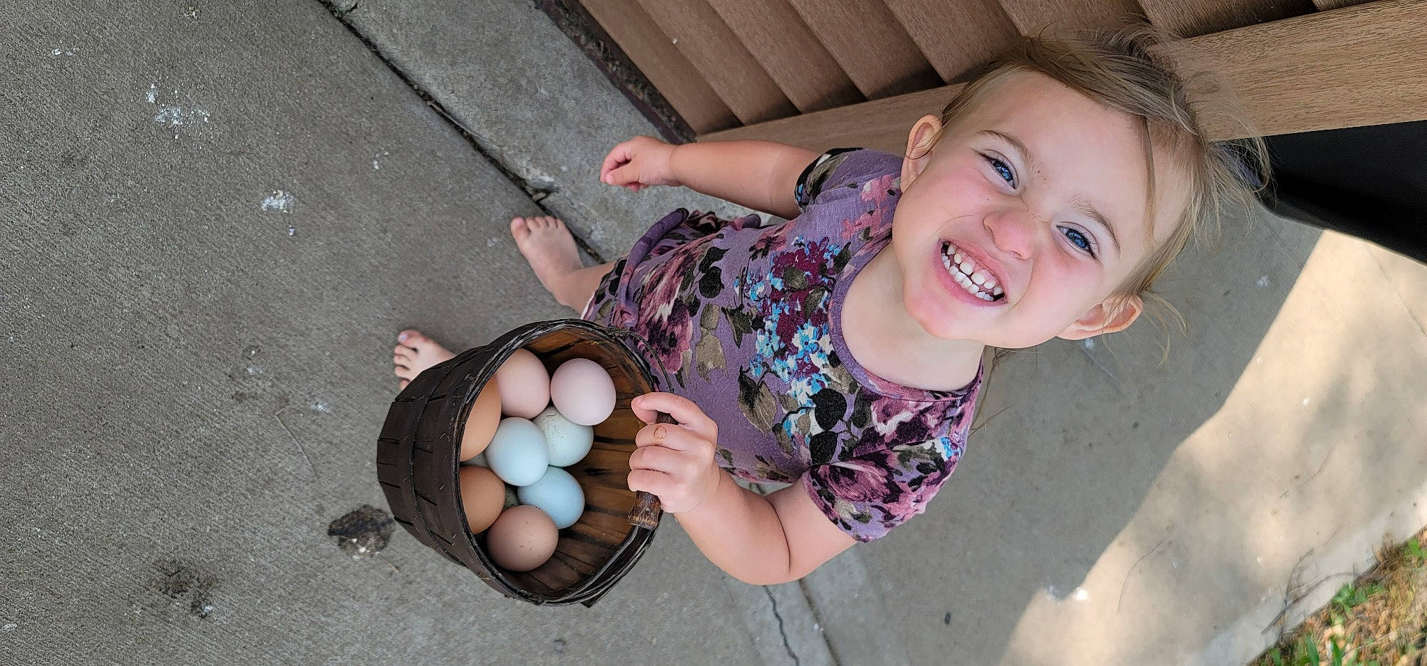 Willa is registered to the contest to win money with this photo: chair, child, comfort_food, easter, easter_egg, egg, food, fun, happy, holiday, ingredient, joy, laugh, leisure, person, sitting, smile, sweetness, t_shirt, toddler