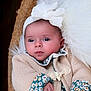 Janna participe au concours pour gagner de l'argent avec cette photo : baby, blanket, bow, child, closeup, cozy, cute, floral_pattern, fur_rug, headband, indoor, infant, knitwear, newborn, peaceful, person, portrait, resting, soft_texture, sweater