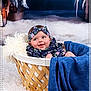 Janna a rejoint le concours — aidez-le/la à gagner de superbes lots ! adorable, baby, basket, blue_blanket, child, cozy, cute, decor, floral_clothing, happy, headband, indoor, infant, newborn, portrait, smiling, soft_texture, studio, white_fur, woven_basket