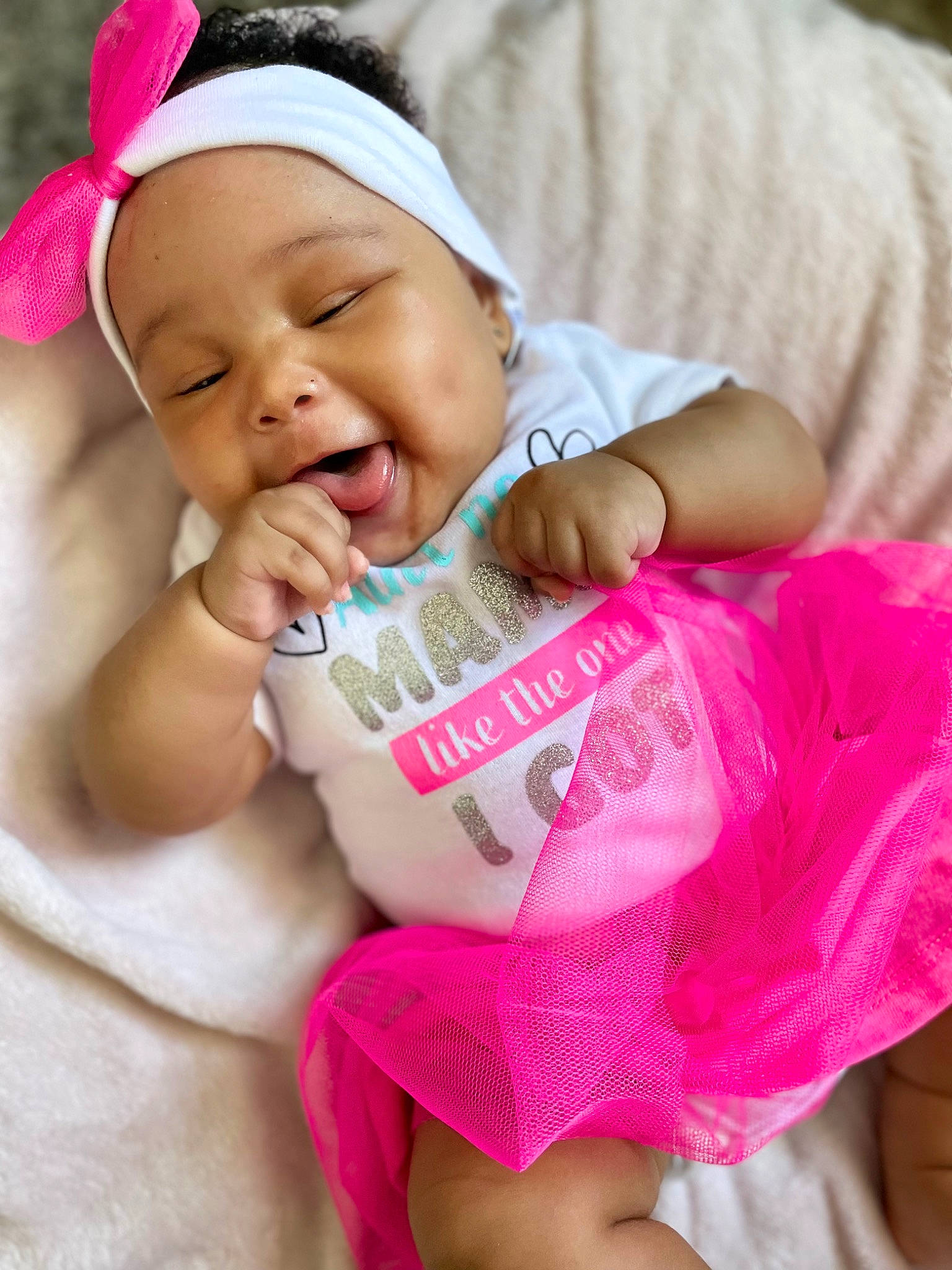 Ailani joined the competition — help win amazing prizes! baby, baby_toddler_clothing, cheek, child, eyelash, face, facial_expression, finger, fun, happy, headgear, headwear, lip, mouth, person, photograph, pink, skin, sleeve, smile