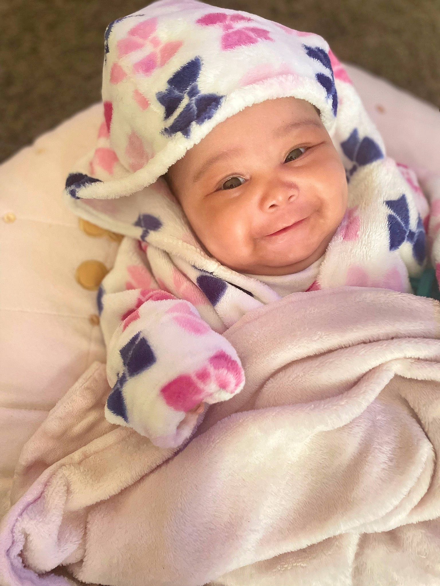 Ailani joined the competition — help win amazing prizes! baby, baby_toddler_clothing, cap, cheek, child, comfort, eyelash, fashion_accessory, happy, headgear, headwear, joy, linens, lip, magenta, person, pink, skin, sleeve, smile