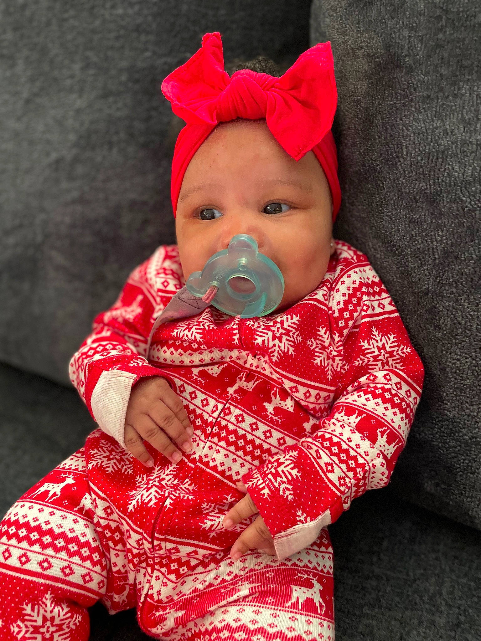 Ailani joined the competition — help win amazing prizes! baby, baby_products, baby_toddler_clothing, cap, cheek, christmas, costume_hat, eye, fictional_character, fun, happy, hat, head, headwear, holiday, human_body, magenta, pattern, person, skin
