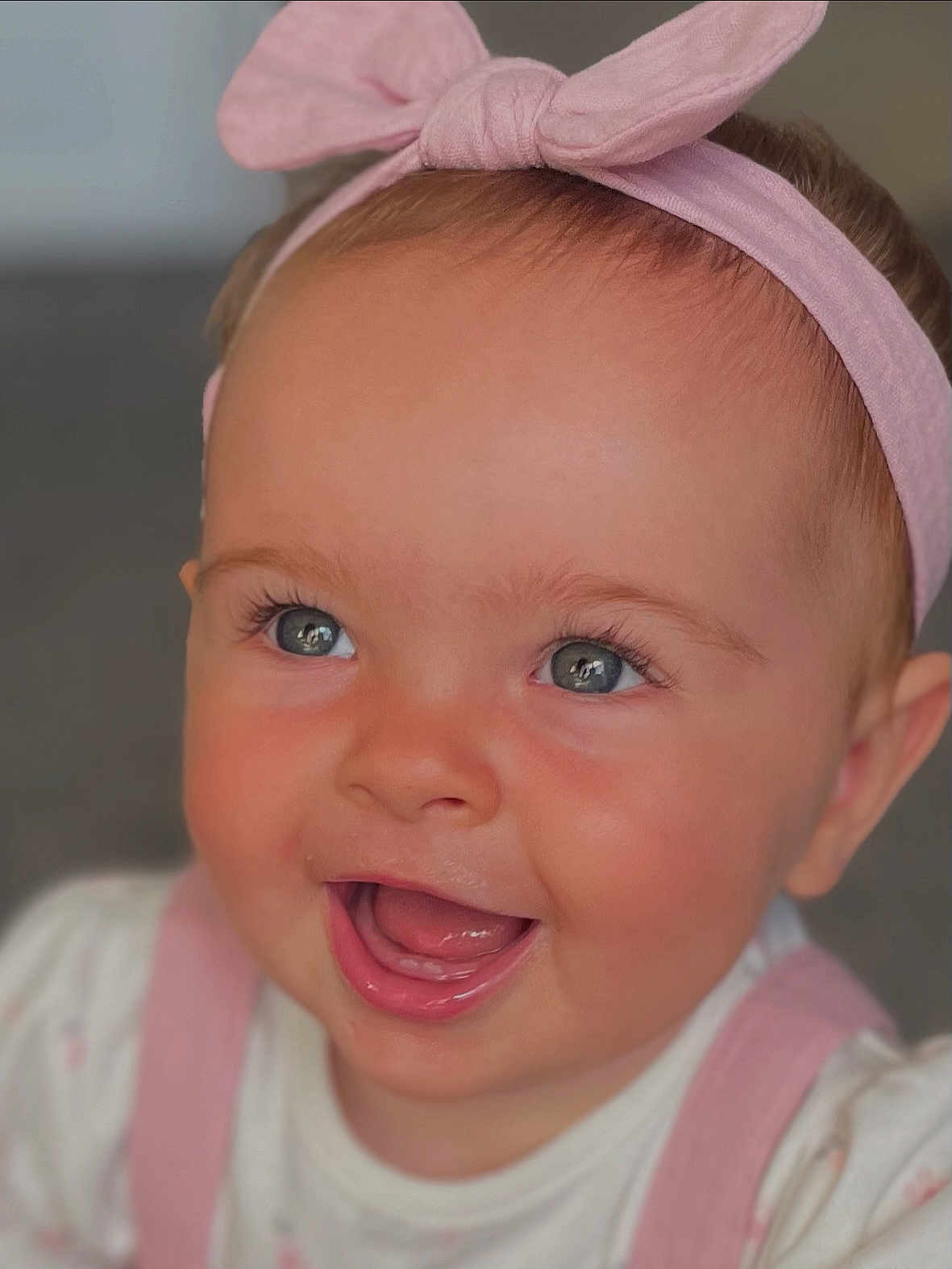 Bodhi joined the competition — help win amazing prizes! baby, child, smiling, headband, pink, blue_eyes, cute, portrait, closeup, happy, infant, face, expression, soft_lighting, clothing, indoors, cheerful, young, person, skin