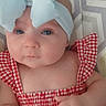 adorable, baby, baby_girl, bow, child, closeup, clothing, cute, eyes, face, hand, headband, indoors, infant, patterned_background, portrait, red_checkered_dress, skin, soft_light, young