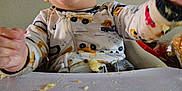 Jensen joined the competition — help win amazing prizes! baby, child, high_chair, food, messy, smiling, happy, indoor, onesie, table, face, mouth_open, hand, seat, feeding, cute, infant, playful, expression, toddler