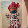 Ryverlynn Rose is registered to the contest to win money with this photo: baby, newborn, sleeping, pacifier, headband, bow, floral, onesie, infant, portrait, cute, soft, cozy, hand, photo_frame, fabric, clothing, resting, child, peaceful