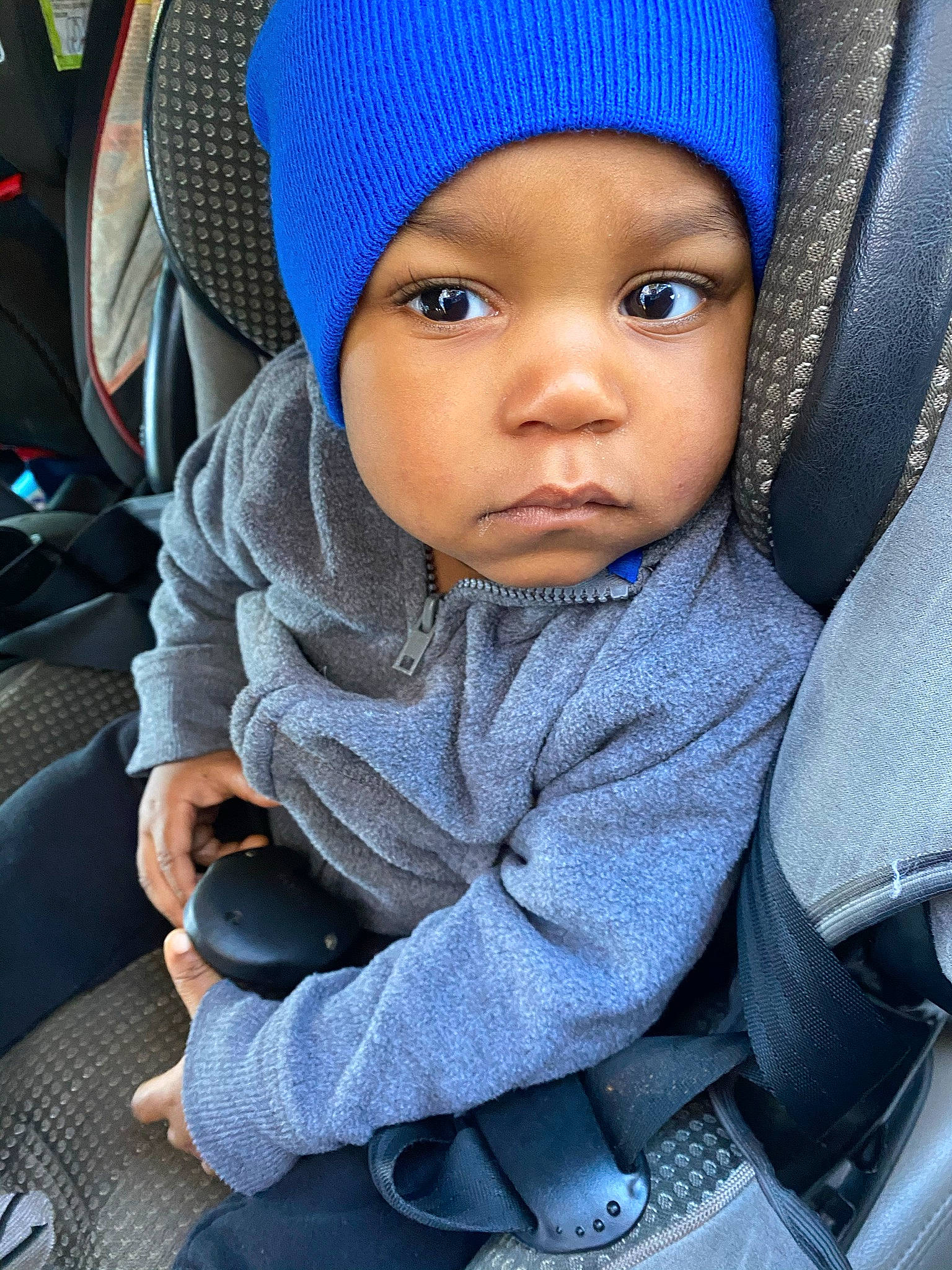 Graysin joined the competition — help win amazing prizes! baby, baby_carriage, beanie, bonnet, cap, car_seat, cheek, child, cool, face, head, headgear, headwear, knit_cap, people, person, product, sitting, skin, smile