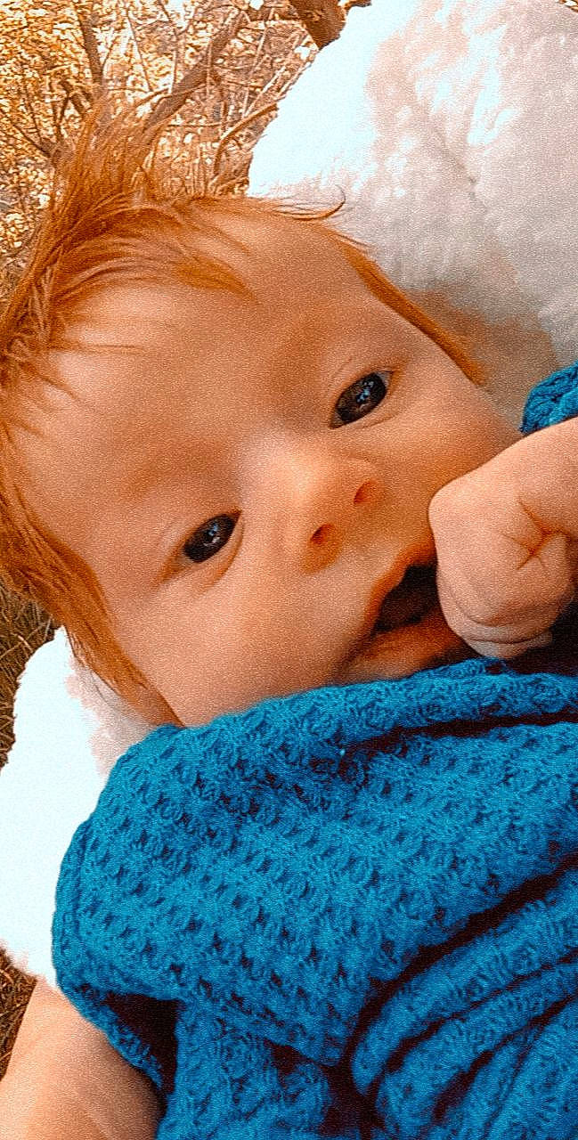 Evalina is registered to the contest to win money with this photo: azure, baby, baby_toddler_clothing, blue, cheek, chin, eye, eyebrow, eyelash, face, finger, head, iris, lip, mouth, nose, organ, person, skin, textile