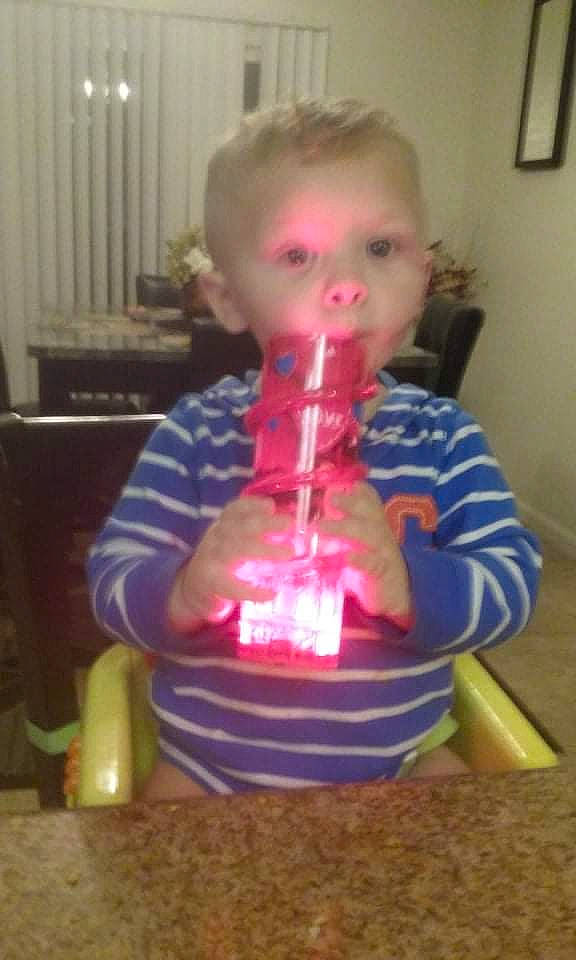 Emmet joined the competition — help win amazing prizes! baby_products, baby_toddler_clothing, birthday, birthday_candle, child, drinkware, electric_blue, event, fun, glass, icing, magenta, party, person, picture_frame, plastic, play, sitting, table, toddler