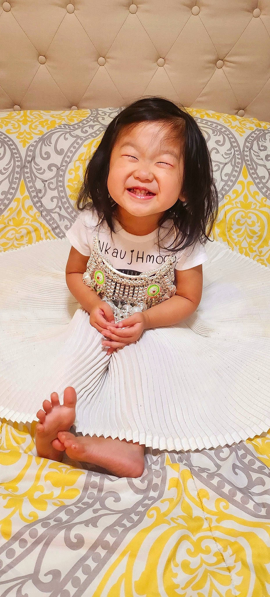 Eleanor is registered to the contest to win money with this photo: baby_toddler_clothing, cheek, child, comfort, day_dress, dress, eye, fun, happy, head, iris, magenta, pattern, person, pink, skin, sleeve, smile, t_shirt, textile