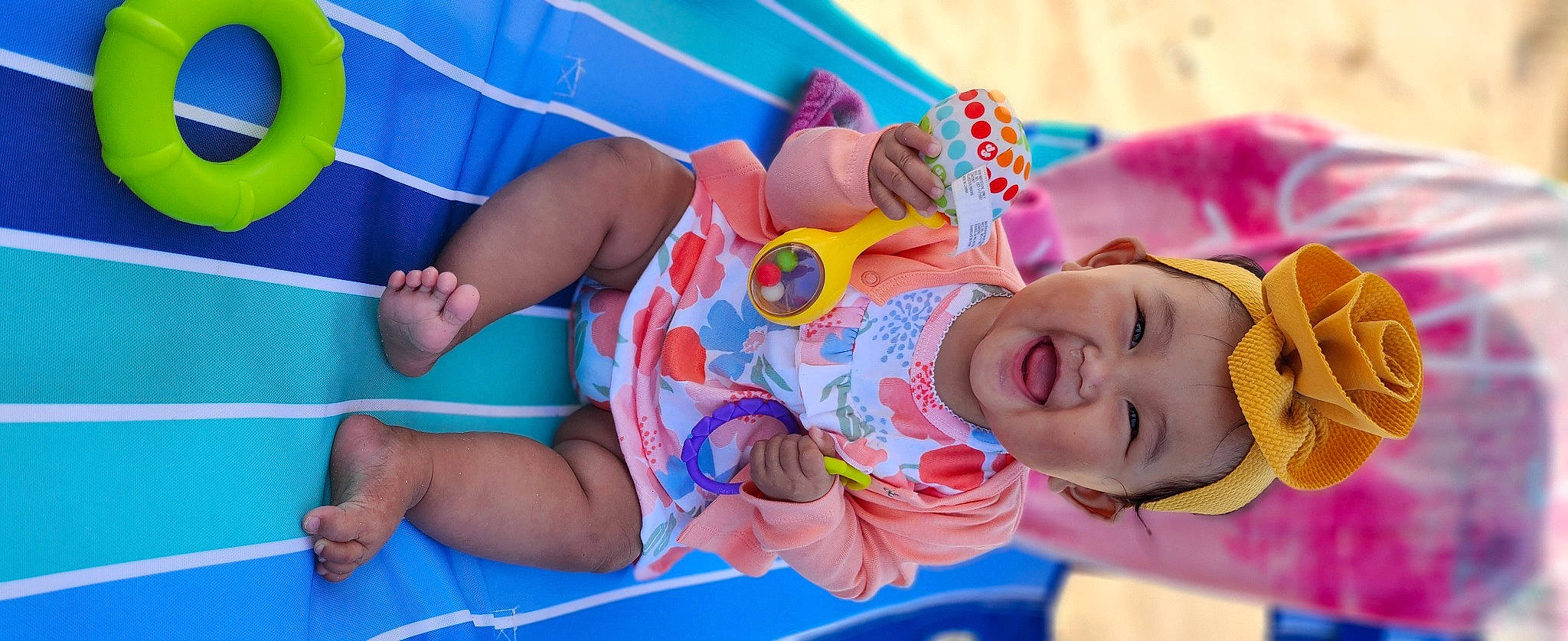 Mila joined the competition — help win amazing prizes! baby, baby_products, baby_toddler_clothing, blue, cheek, child, face, fun, happy, headwear, leisure, person, pink, play, room, skin, smile, summer, toddler, toy