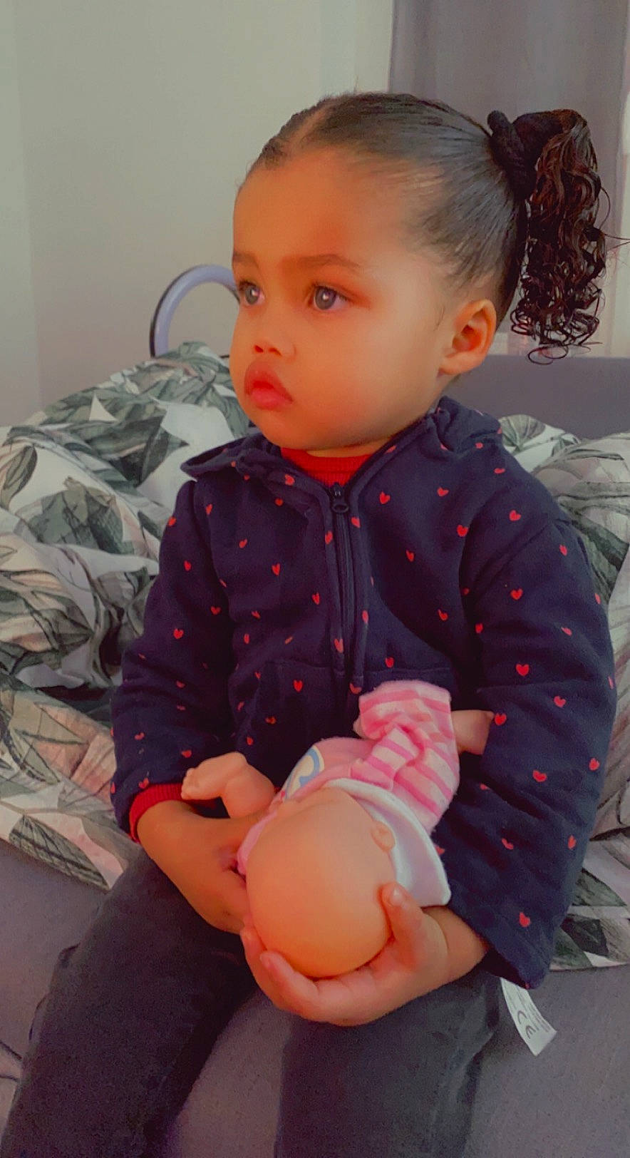 Yonah participe au concours pour gagner de l'argent avec cette photo : abdomen, baby, baby_toddler_clothing, cheek, child, comfort, face, flooring, joint, lip, mouth, nose, organ, pattern, person, sitting, skin, sleeve, textile, thigh