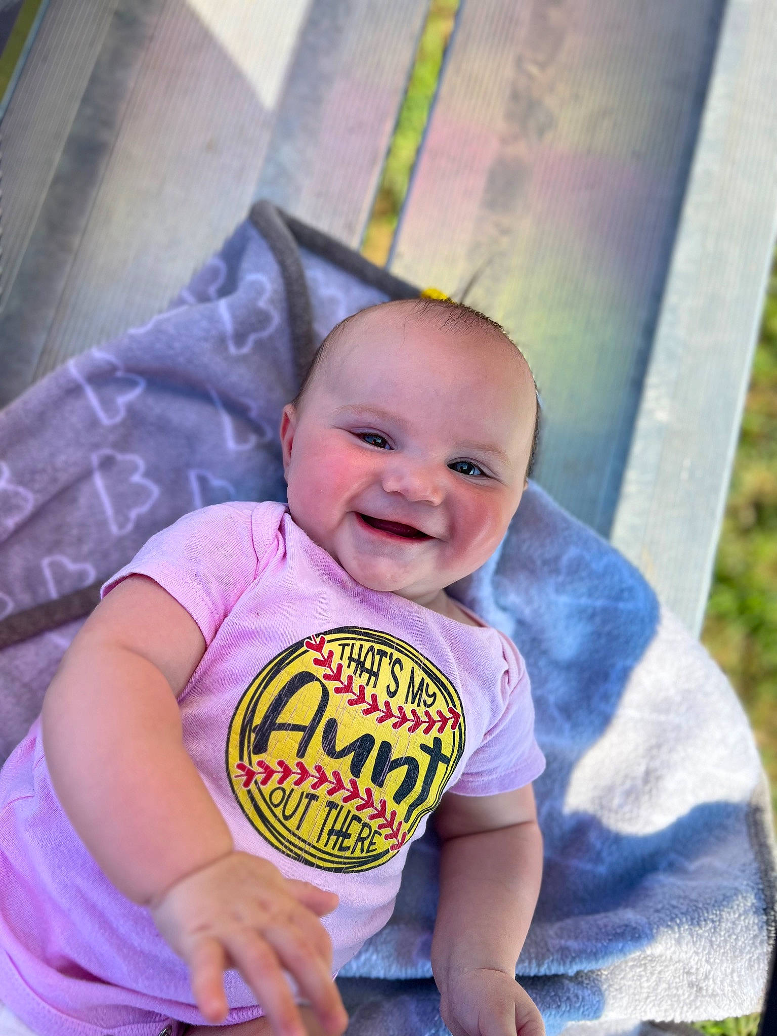 Ellah Rae-lynn joined the competition — help win amazing prizes! arm, baby, baby_laughing, baby_toddler_clothing, child, cool, electric_blue, fun, grass, happy, joy, leisure, magenta, people_in_nature, person, photograph, pink, purple, skin, smile