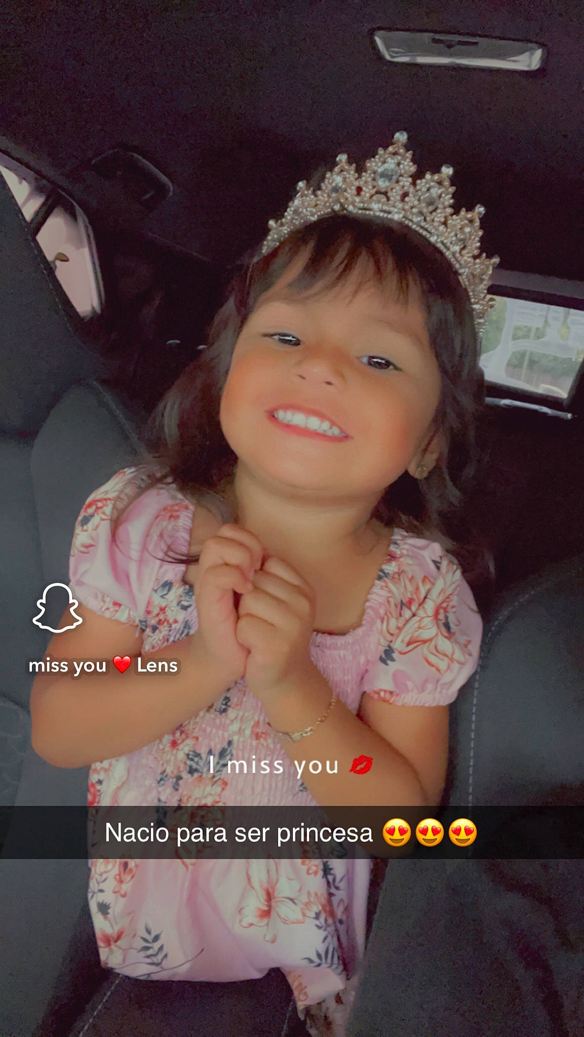 Gabriela is registered to the contest to win money with this photo: black_hair, child, cool, eyebrow, eyelash, facial_expression, finger, flash_photography, fun, gesture, hairstyle, happy, headpiece, jewellery, joy, lip, long_hair, person, pink, skin