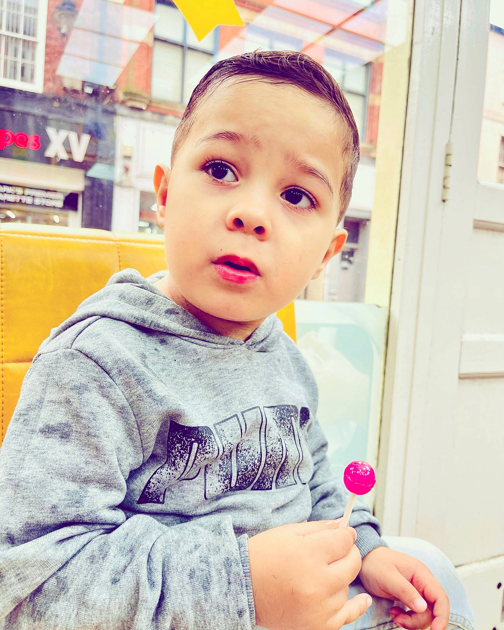 Kevin is registered to the contest to win money with this photo: baby_toddler_clothing, child, cool, door, eyelash, fun, happy, lip, magenta, nail, nose, pattern, person, play, portrait_photography, selfie, sitting, sleeve, surprise, t_shirt