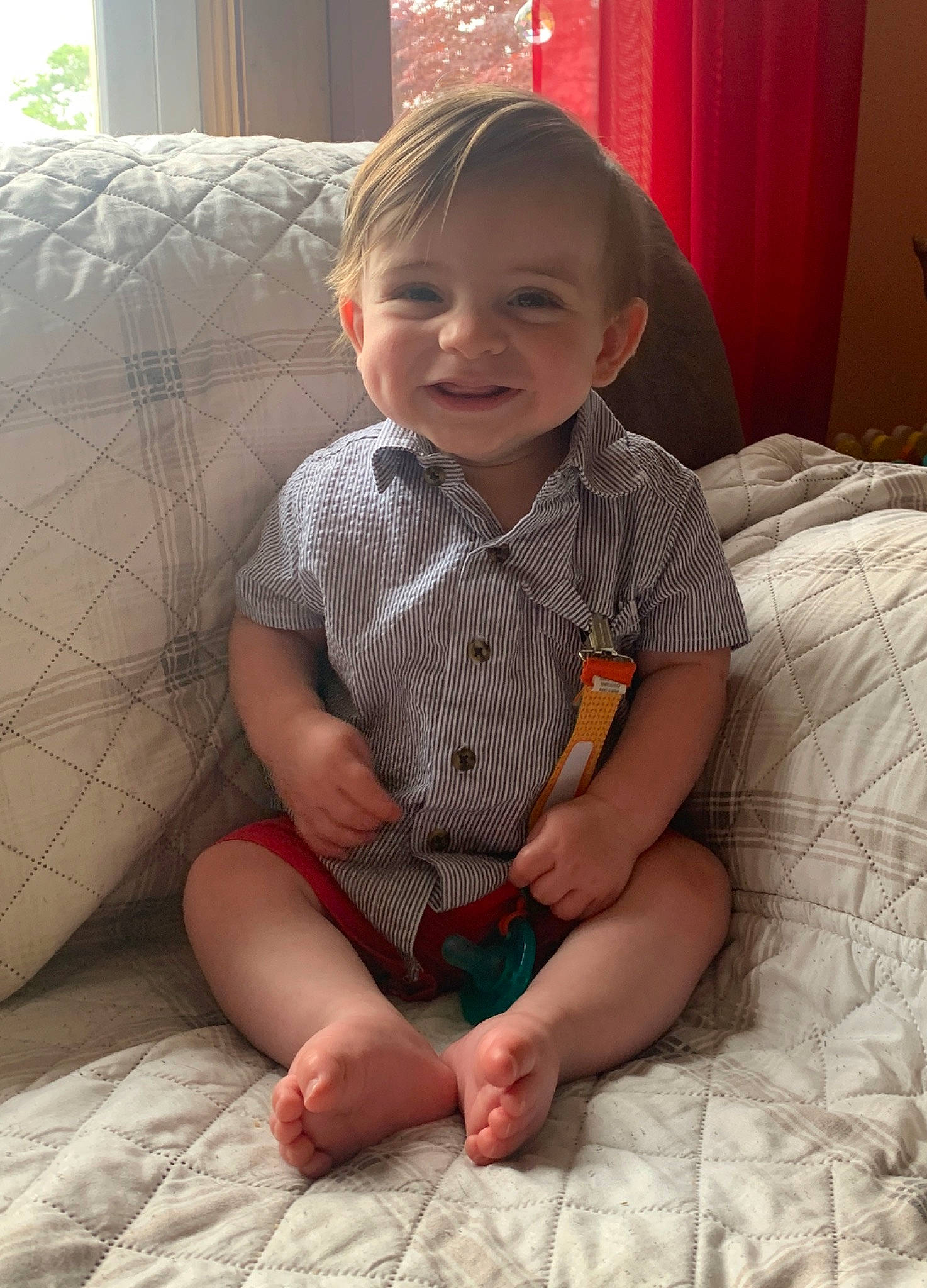 Dalton is registered to the contest to win money with this photo: arm, baby, cheek, child, comfort, face, finger, head, joy, leg, person, play, sitting, skin, smile, toddler