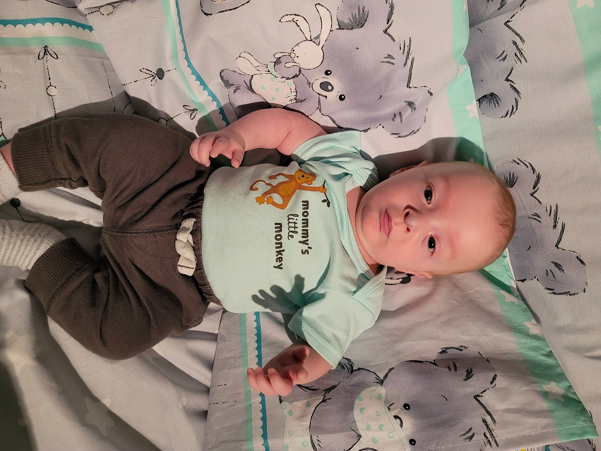 Maddox is registered to the contest to win money with this photo: baby, baby_products, baby_toddler_clothing, bedtime, cheek, child, comfort, font, happy, illustration, linens, nap, pattern, person, pink, product, room, sleep, textile, toddler