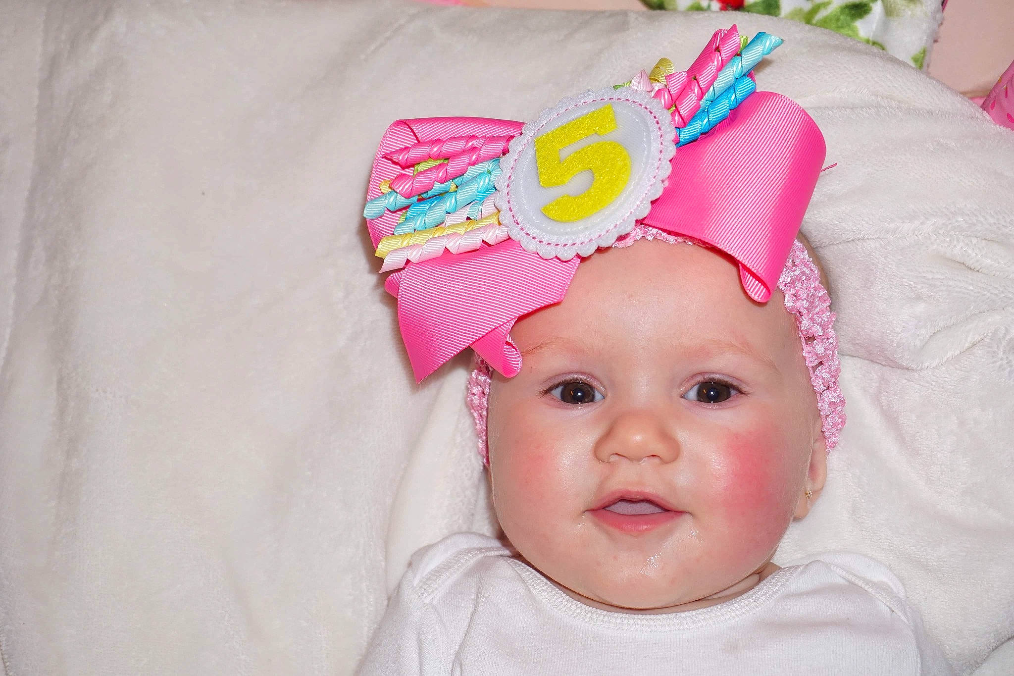 Everleigh joined the competition — help win amazing prizes! baby, baby_toddler_clothing, bonnet, cap, child, clothing, costume_accessory, fashion_accessory, hair_accessory, hat, head, headgear, person, pink, toddler