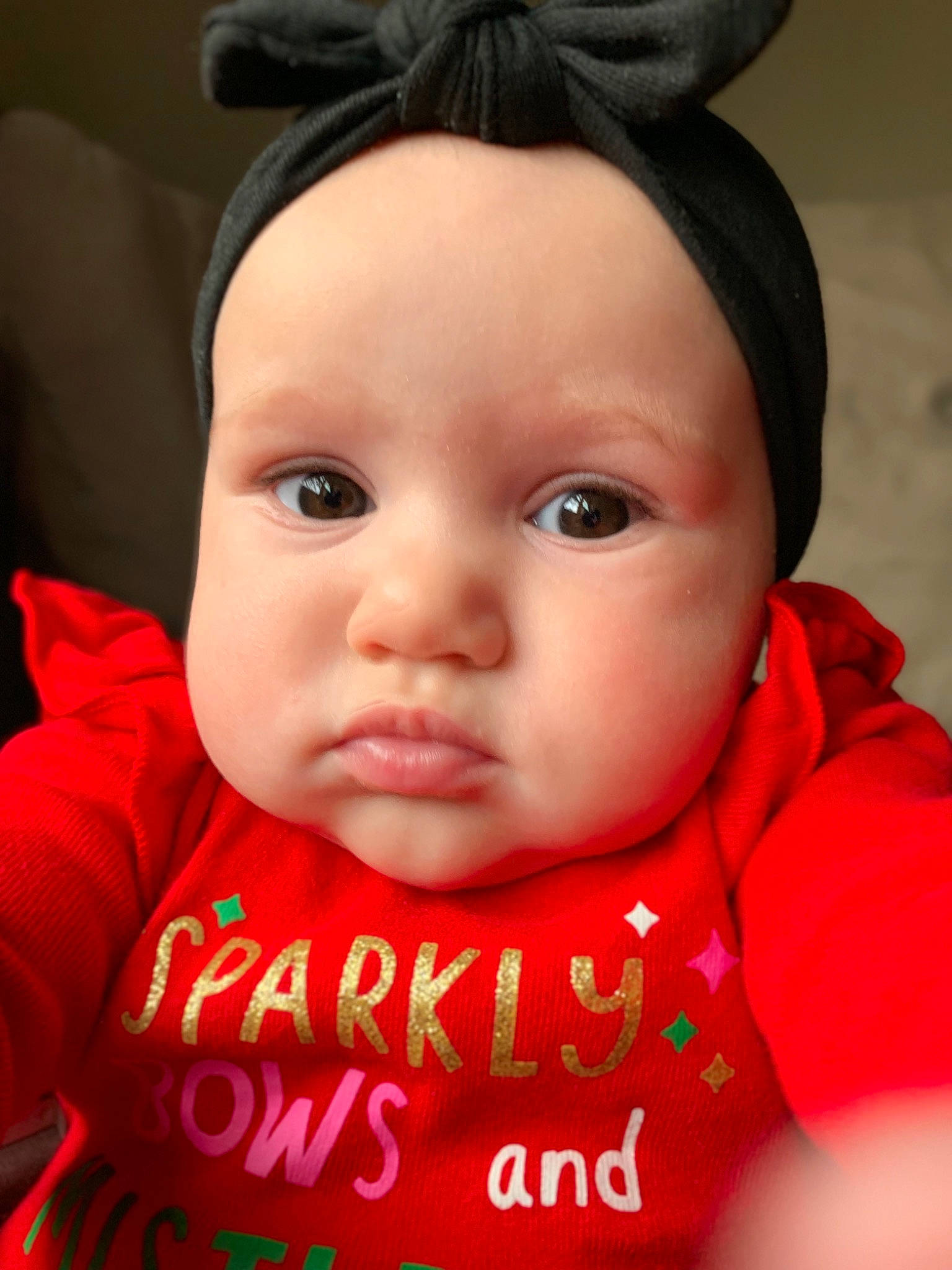 Everleigh joined the competition — help win amazing prizes! baby, cheek, child, chin, close_up, ear, eye, eyebrow, face, forehead, head, headgear, iris, lip, mouth, nose, person, photography, red, skin