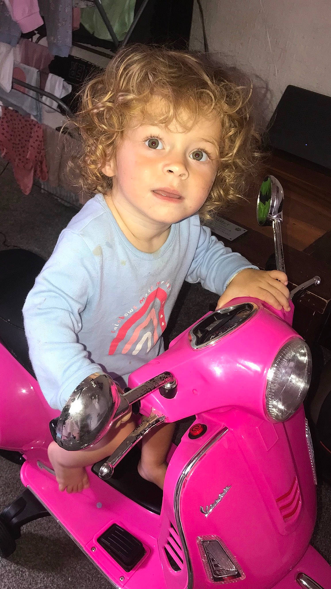 Rosie joined the competition — help win amazing prizes! auto_part, automotive_design, automotive_exterior, automotive_lighting, bumper, child, eye, fender, fun, hairstyle, happy, head, headlamp, motor_vehicle, person, pink, riding_toy, skin, steering_wheel, toddler