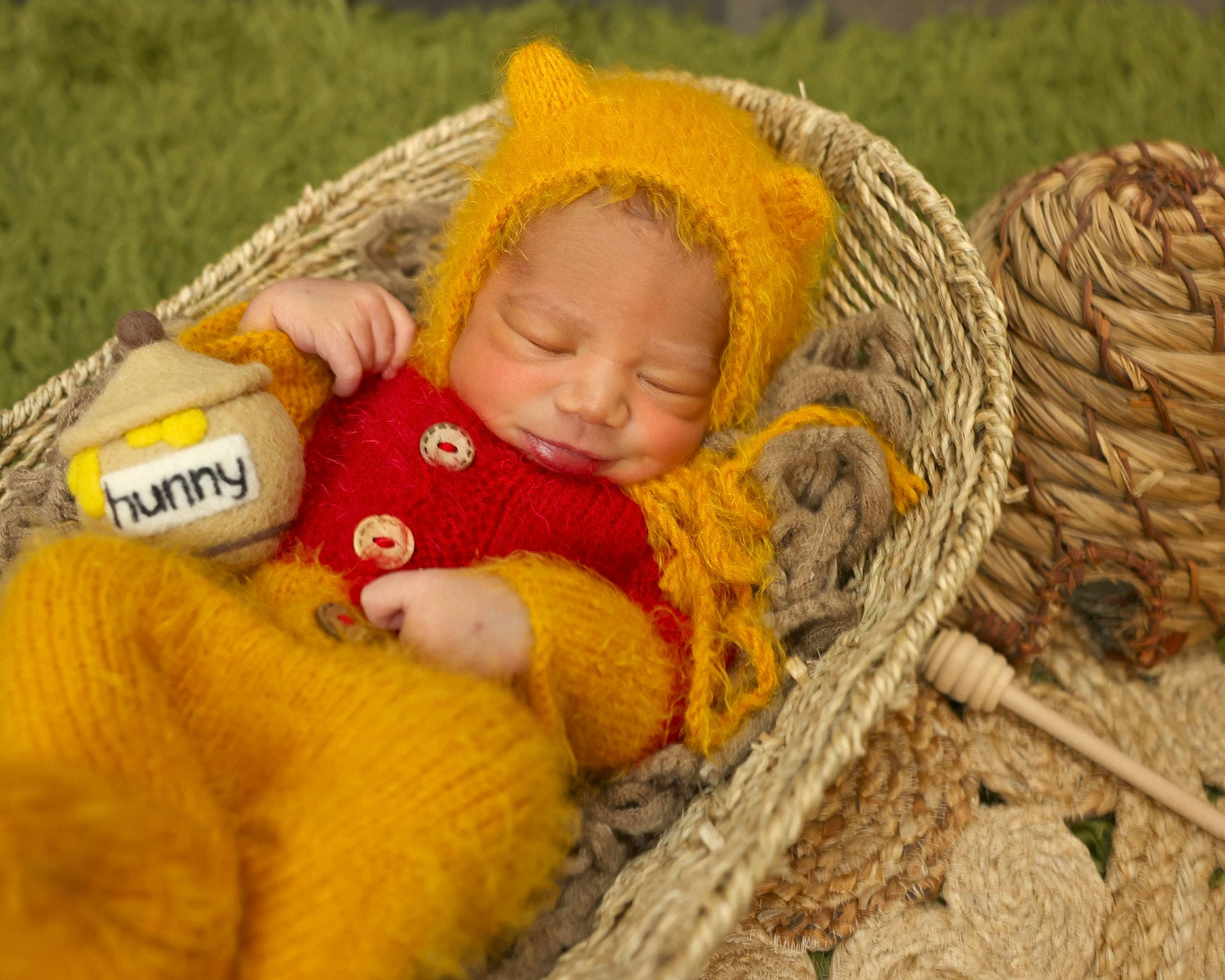 Kash joined the competition — help win amazing prizes! baby, baby_toddler_clothing, basket, cap, comfort, fur, grass, happy, headgear, knit_cap, linens, people_in_nature, person, plant, skin, toddler, toy, wood, wool, woolen