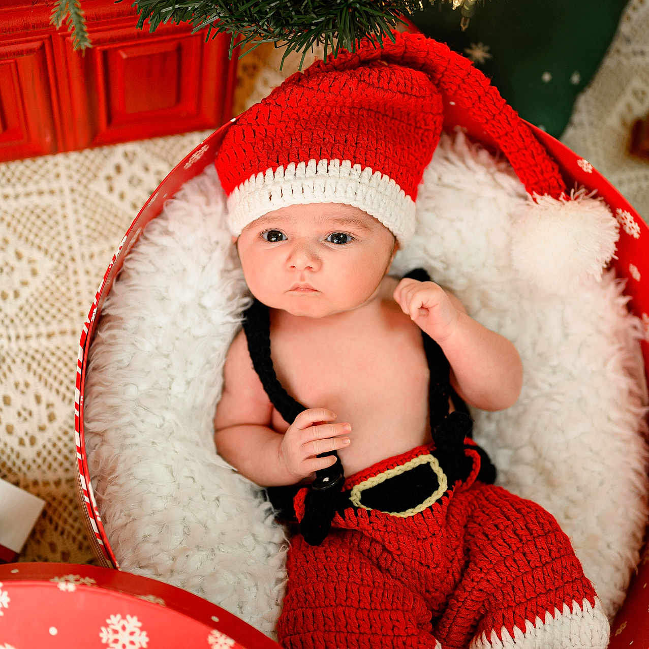 Amar is registered to the contest to win money with this photo: baby, beanie, bodypart, bonnet, cap, clothing, couch, face, finger, furniture, hand, happy, hat, head, knitwear, newborn, person, photography, portrait, sweater