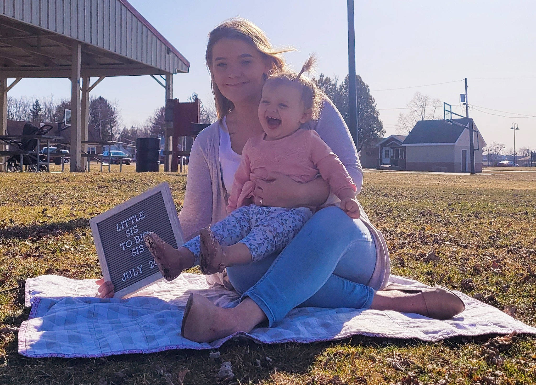 Evee joined the competition — help win amazing prizes! electric_blue, fun, grass, grassland, happy, hat, human_leg, joy, landscape, leaf, leisure, meadow, people_in_nature, person, recreation, sitting, sky, smile, summer, sun_hat