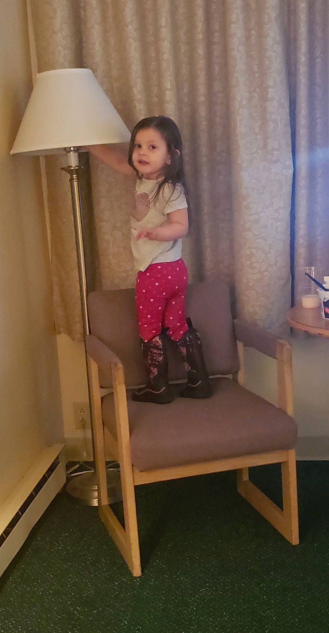 Navayah joined the competition — help win amazing prizes! baby_toddler_clothing, child, comfort, flooring, hardwood, human_leg, knee, lamp, leg, magenta, person, pink, purple, shorts, sitting, sleeve, smile, sock, thigh, toddler