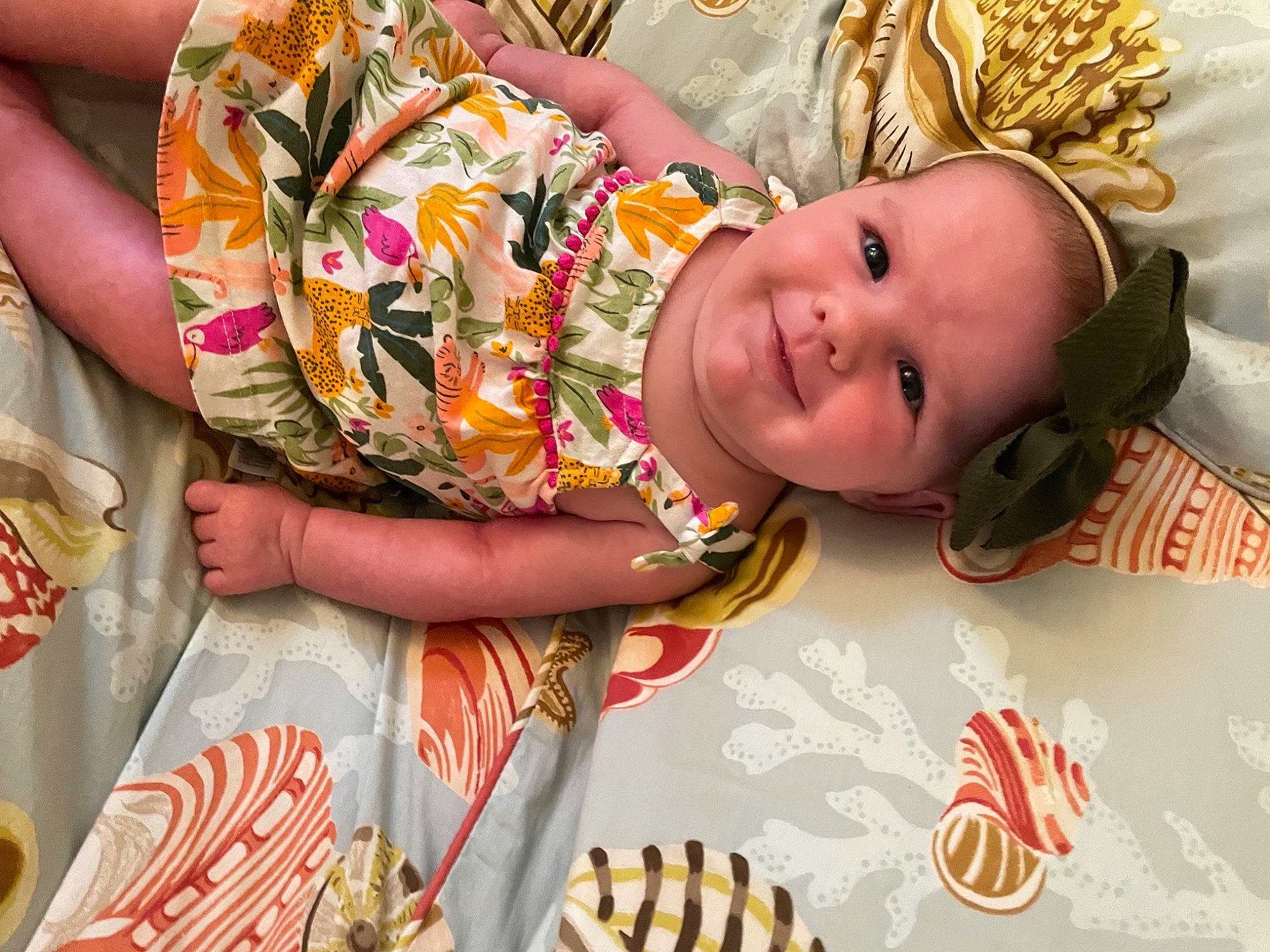 Gabby is registered to the contest to win money with this photo: baby, baby_products, baby_toddler_clothing, cake_decorating, child, dessert, event, eye, finger, food, fun, happy, head, joy, nail, orange, pattern, person, smile, textile
