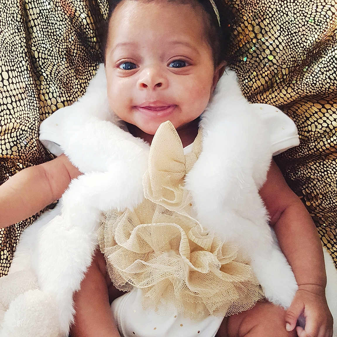 Anabelle joined the competition — help win amazing prizes! baby, baby_toddler_clothing, beauty, child, child_model, costume, dress, fashion_accessory, fur, hair_accessory, happy, headgear, headpiece, person, photo_shoot, sitting, skin, smile, toddler