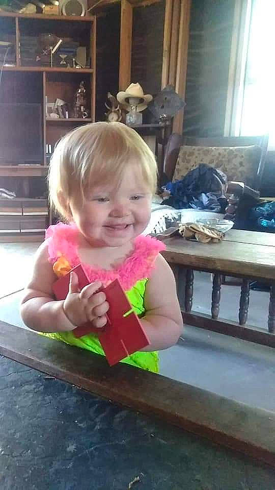 Cynthia is registered to the contest to win money with this photo: baby, child, eating, joy, person, play, smile, toddler