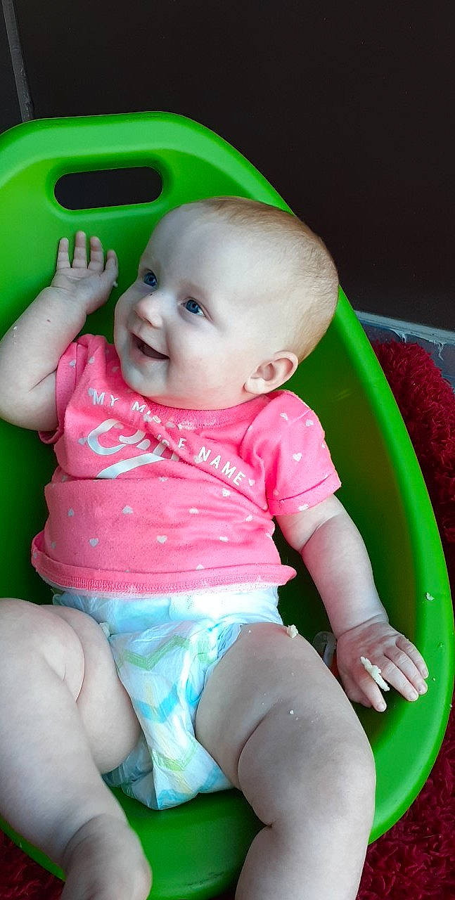 Jane joined the competition — help win amazing prizes! baby, baby_products, baby_toddler_clothing, cheek, child, green, joy, person, play, product, sitting, skin, toddler