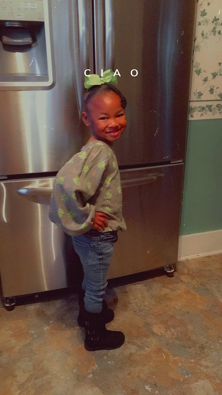 Jenesis joined the competition — help win amazing prizes! cabinetry, child, door, door_handle, face, floor, flooring, gas, hat, home_appliance, joy, kitchen, kitchen_appliance, major_appliance, person, room, shoe, sleeve, smile, standing