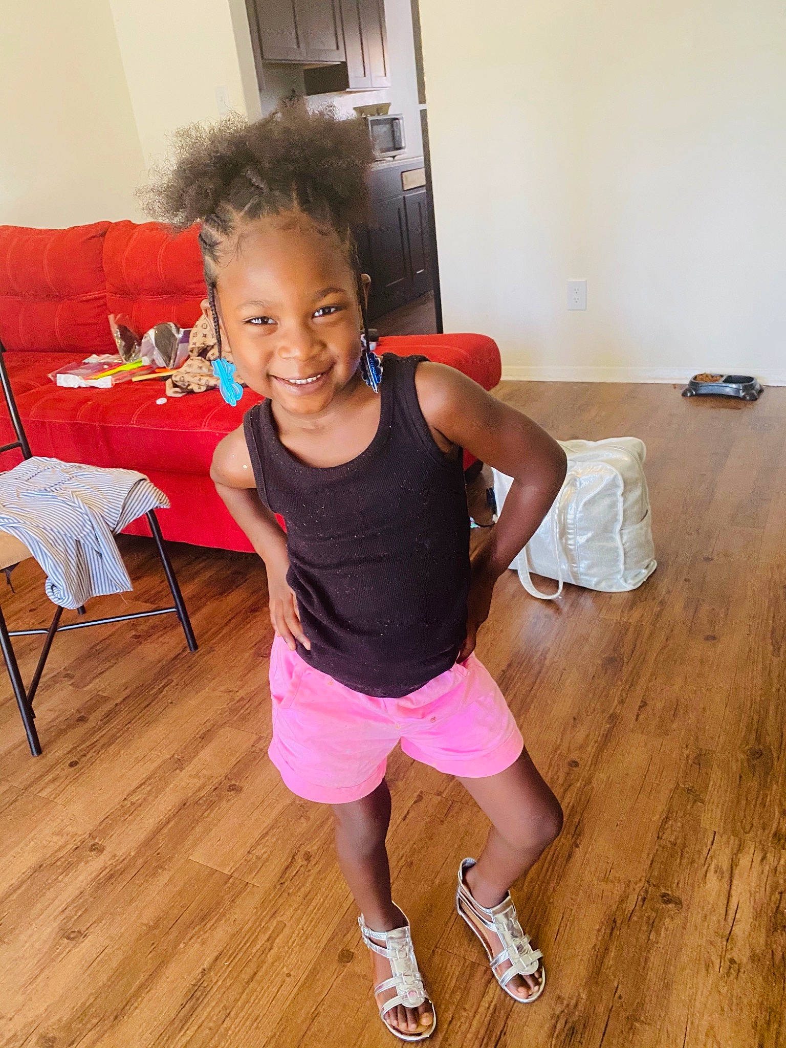 Azaria joined the competition — help win amazing prizes! active_tank, armrest, baby_toddler_clothing, calf, couch, floor, flooring, hardwood, human_leg, joy, laminate_flooring, living_room, person, plywood, room, shoe, sneakers, thigh, varnish, wood
