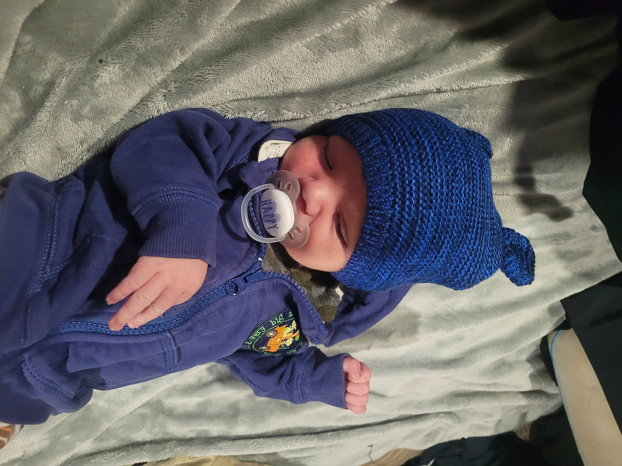 Dante is registered to the contest to win money with this photo: baby, baby_products, baby_safety, baby_sleeping, baby_toddler_clothing, bedtime, cap, child, comfort, electric_blue, hat, headwear, linens, nap, person, room, sleep, sleeve, toddler