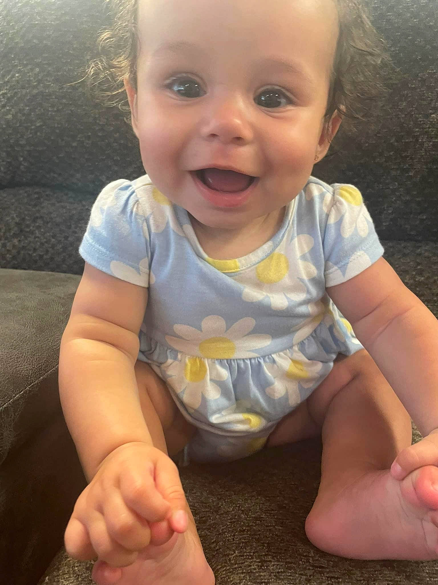 Juliette is registered to the contest to win money with this photo: baby, baby_toddler_clothing, beauty, cheek, child, finger, fun, gesture, grass, happy, human_body, human_leg, person, photograph, sitting, skin, sleeve, smile, t_shirt, thumb