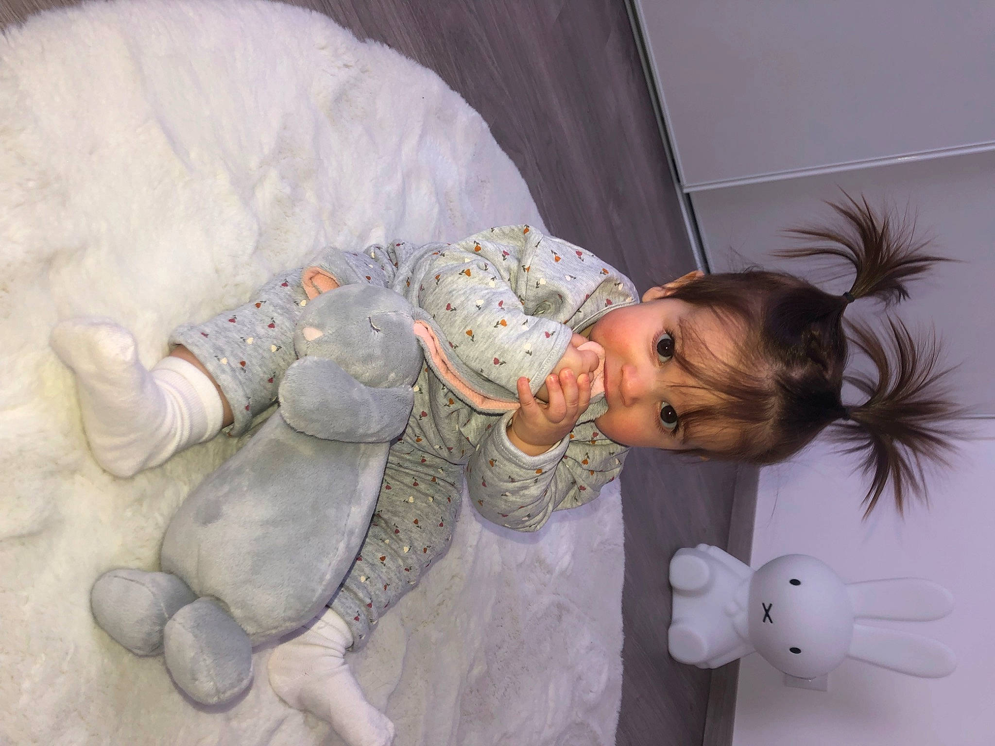 Chiara participe au concours pour gagner de l'argent avec cette photo : baby, baby_products, baby_toddler_clothing, child, comfort, eye, flooring, fun, hairstyle, happy, head, linens, mammal, person, reptile, room, sitting, skin, stuffed_toy, textile