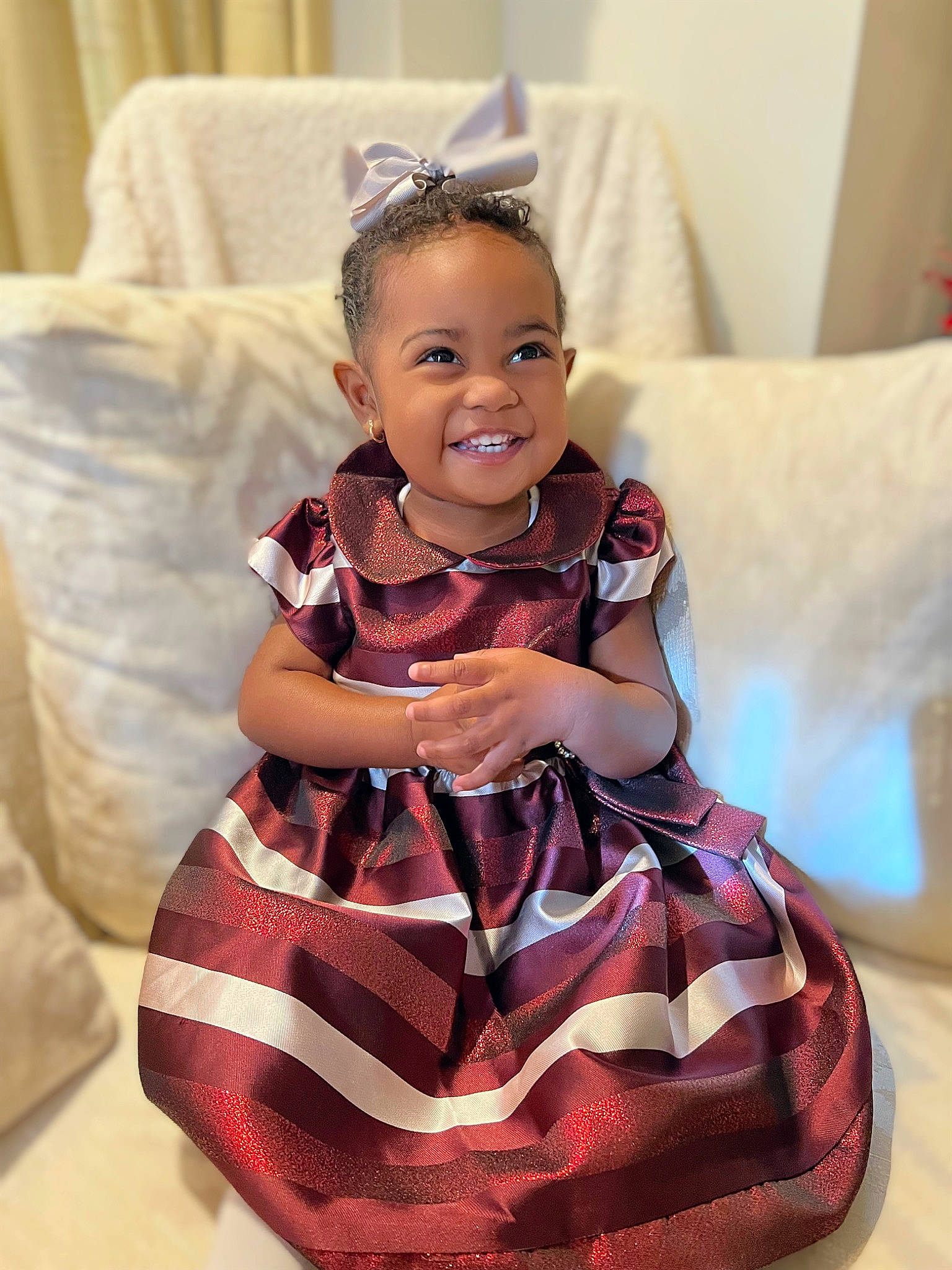 Autumn joined the competition — help win amazing prizes! baby_toddler_clothing, child, couch, day_dress, dress, face, facial_expression, fun, hairstyle, happy, head, joy, neck, person, pink, purple, skin, sleeve, smile, textile
