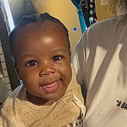 Hyndrex joined the competition — help win amazing prizes! baby, child, smile, tongue_out, indoor, person, hand, shirt, mirror, towel, polka_dot, hair, face, clothing, holding, happy, closeup, portrait, skin, expression