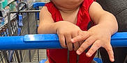 Eli joined the competition — help win amazing prizes! aisle, baby, blue_handle, child, curious, cute, face, floor, grocery_store, hand, indoors, infant, legs, person, products, red_clothing, shelves, shopping, shopping_cart, tongue