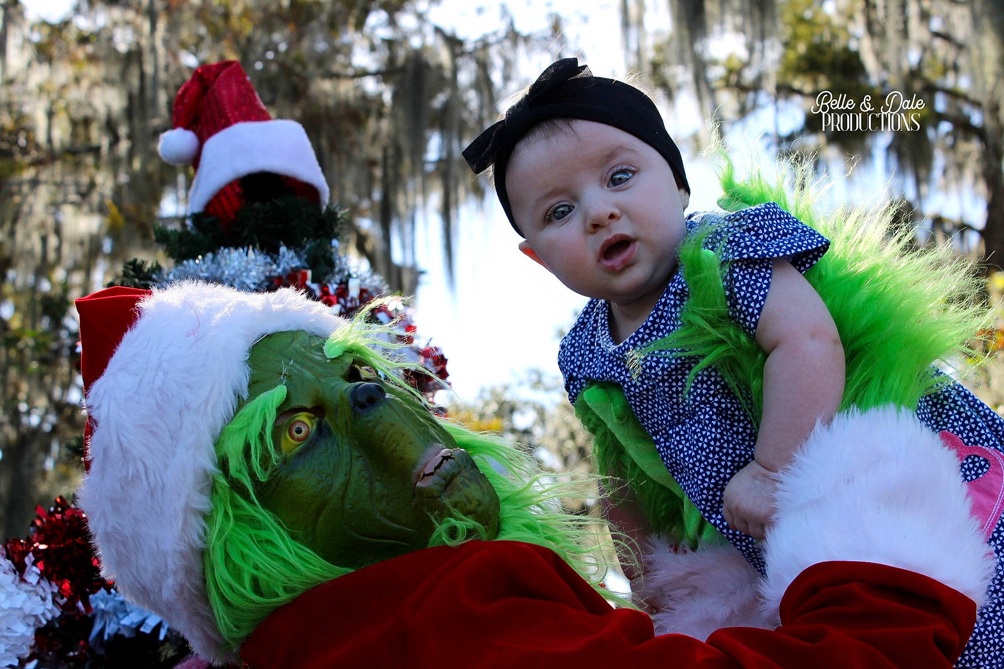 Christine is registered to the contest to win money with this photo: baby, baby_toddler_clothing, cap, child, event, fictional_character, fun, grass, happy, hat, headwear, holiday, leisure, pattern, people_in_nature, person, plant, recreation, sun_hat, toddler
