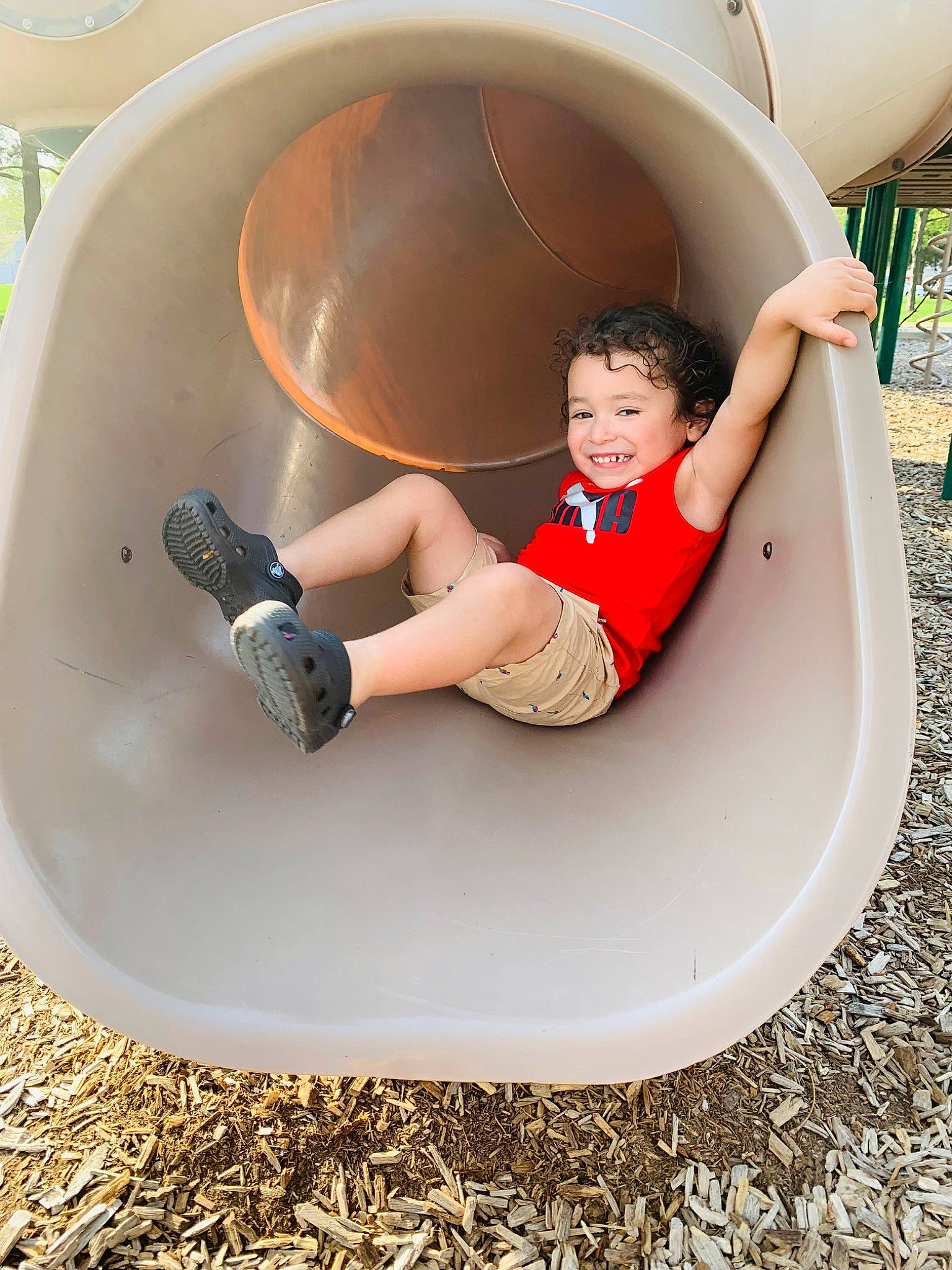 Fabian joined the competition — help win amazing prizes! automotive_tire, automotive_wheel_system, bumper, child, circle, comfort, fender, fun, grass, human_leg, joy, leg, leisure, person, product, shorts, sitting, smile, sneakers, t_shirt