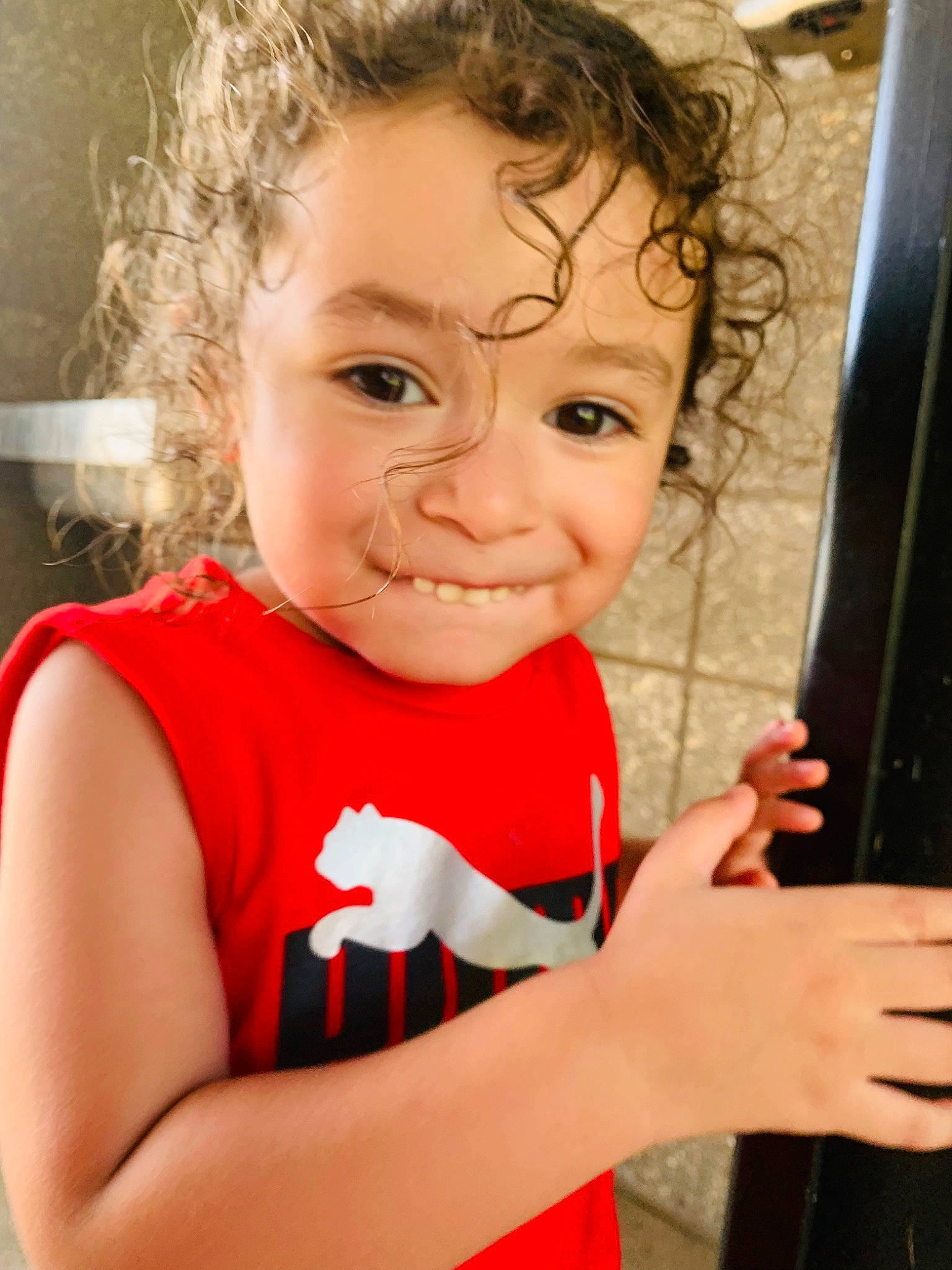 Fabian is registered to the contest to win money with this photo: arm, baby_toddler_clothing, cheek, chin, face, facial_expression, fun, gesture, hairstyle, hand, happy, head, lip, mouth, nose, person, shoulder, skin, sleeve, smile