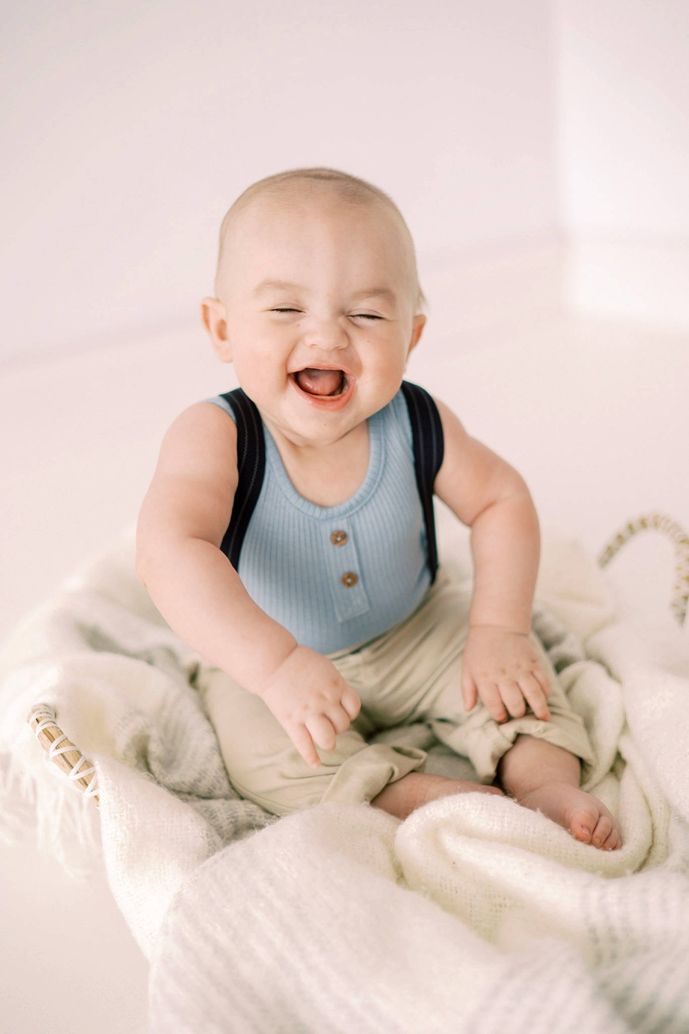 Reece is registered to the contest to win money with this photo: baby, baby_toddler_clothing, cheek, child, chin, comfort, eye, finger, flash_photography, gesture, happy, head, human_body, joy, person, product, sitting, skin, sleeve, smile