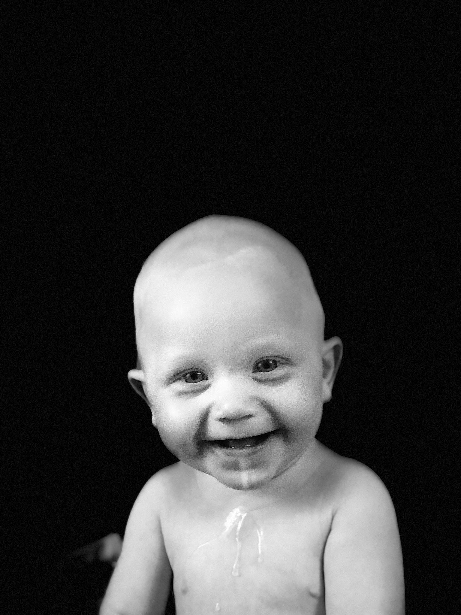 Caysen is registered to the contest to win money with this photo: art, baby, cheek, chest, chin, eyebrow, eyelash, flash_photography, gesture, happy, jaw, joy, lip, monochrome, monochrome_photography, no_expression, nose, person, portrait, portrait_photography