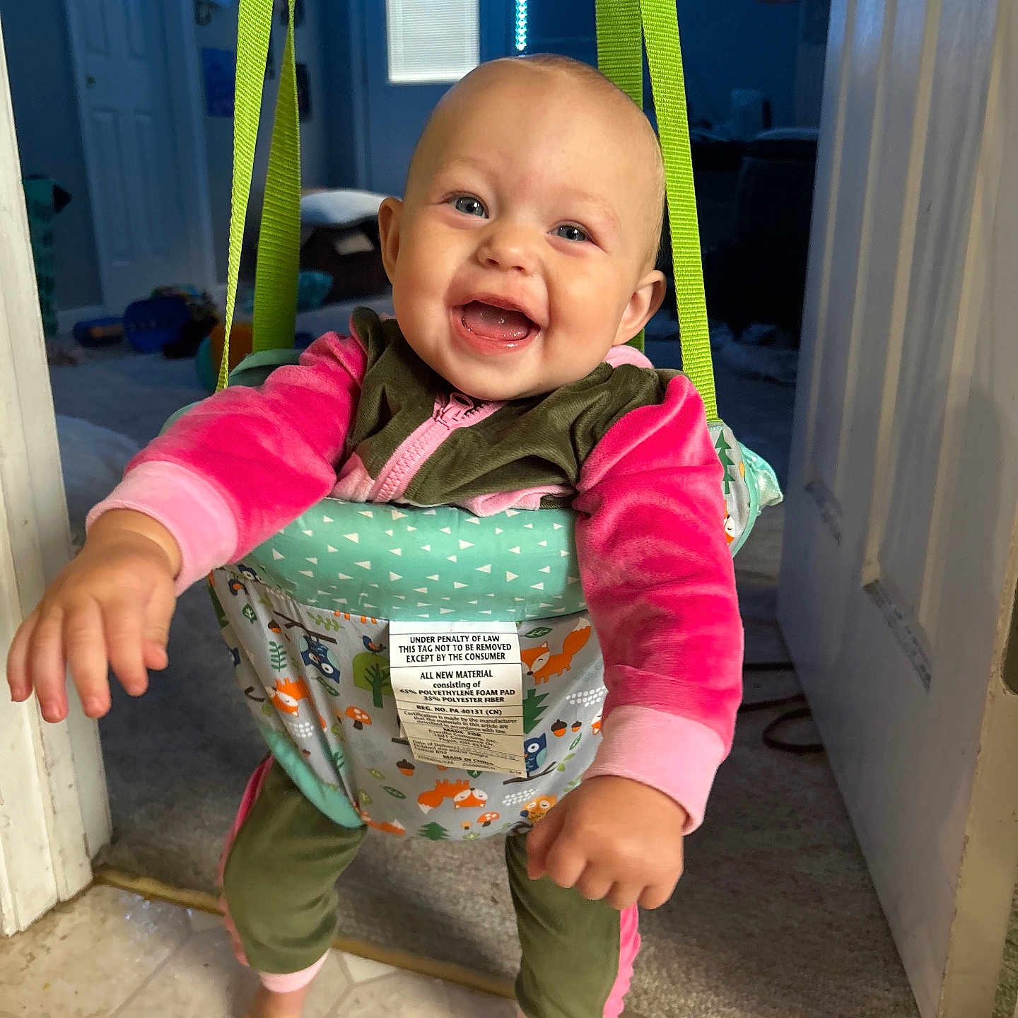 Octavia is registered to the contest to win money with this photo: accessories, baby, bag, city, clothing, coat, door, face, handbag, happy, head, jacket, laughing, pants, person, photography, plant, portrait, pottedplant, road