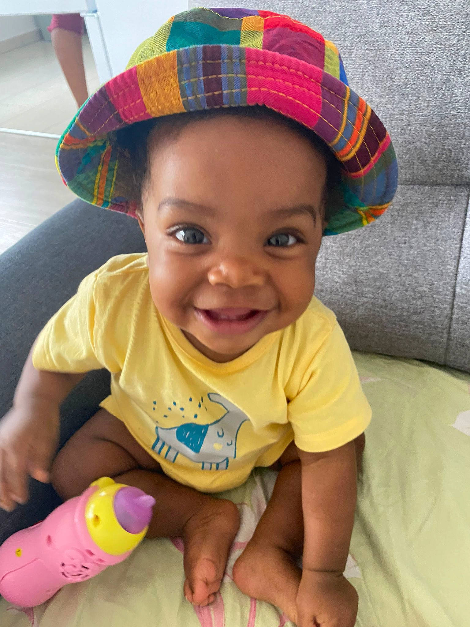 Lyhana participe au concours pour gagner de l'argent avec cette photo : baby_toddler_clothing, blue, cap, cheek, chin, eye, face, happy, head, joy, lip, nose, organ, person, photograph, pink, product, skin, smile, textile