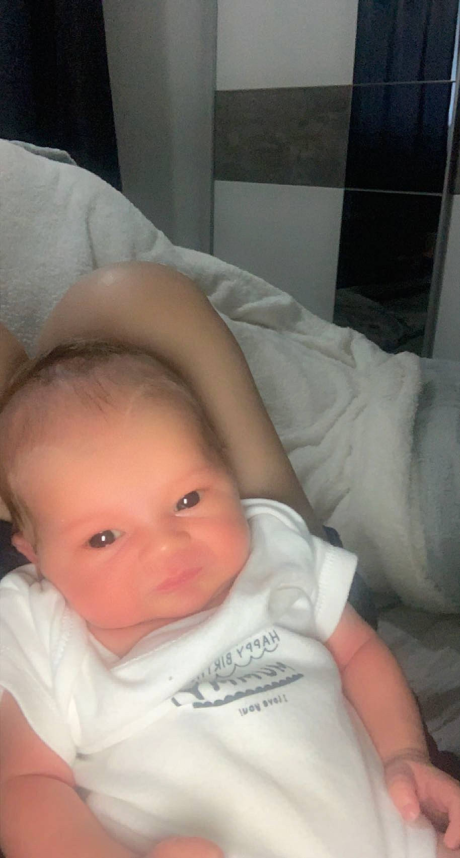 Alishyia is registered to the contest to win money with this photo: baby, baby_products, baby_toddler_clothing, cheek, chest, child, chin, comfort, eye, eyebrow, eyelash, forehead, hair, iris, lip, mouth, nose, person, sitting, skin