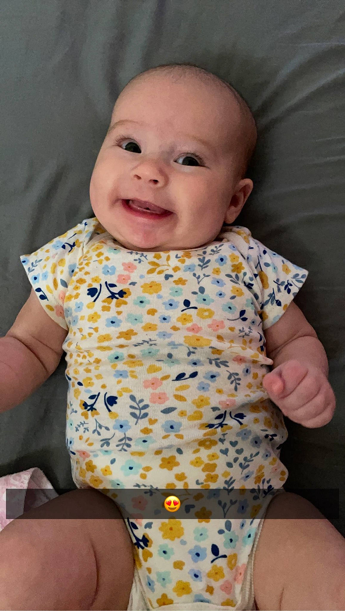 Nevaeh is registered to the contest to win money with this photo: baby, baby_toddler_clothing, cheek, chin, collar, comfort, face, facial_expression, head, iris, neck, nose, person, pink, product, skin, sleeve, smile, standing, textile